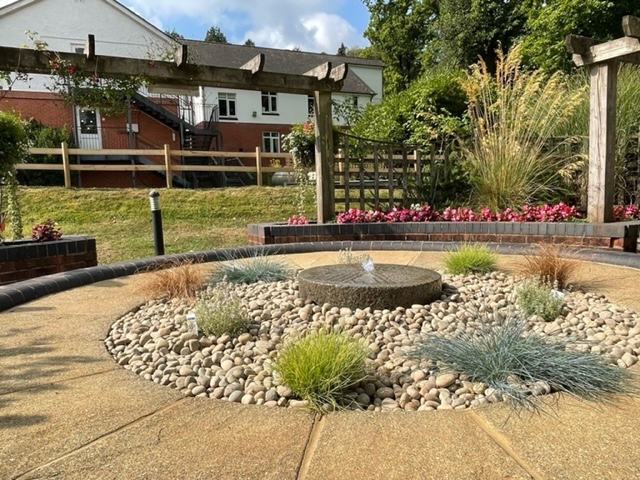 garden patio with plants and rock garden